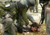 Arrest of Matan Cohen, hebron 1-2-05 Foto: reuters